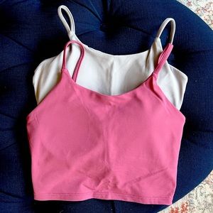 A set of two, size small, workout crop tops that are barely worn.